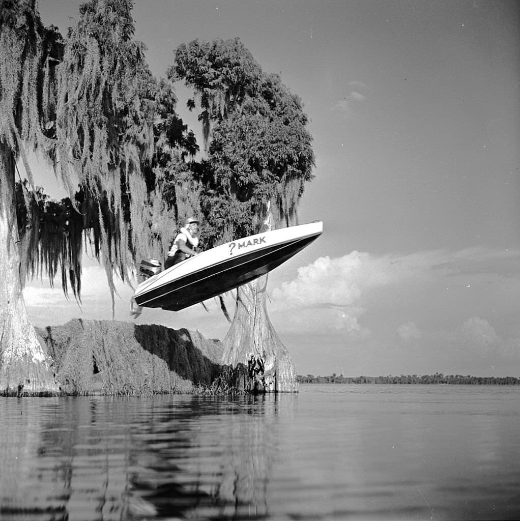 #18 A boat flies over a ramp, just one of the obstacles on the Cypress Gardens speedboat race course in Florida, 1956