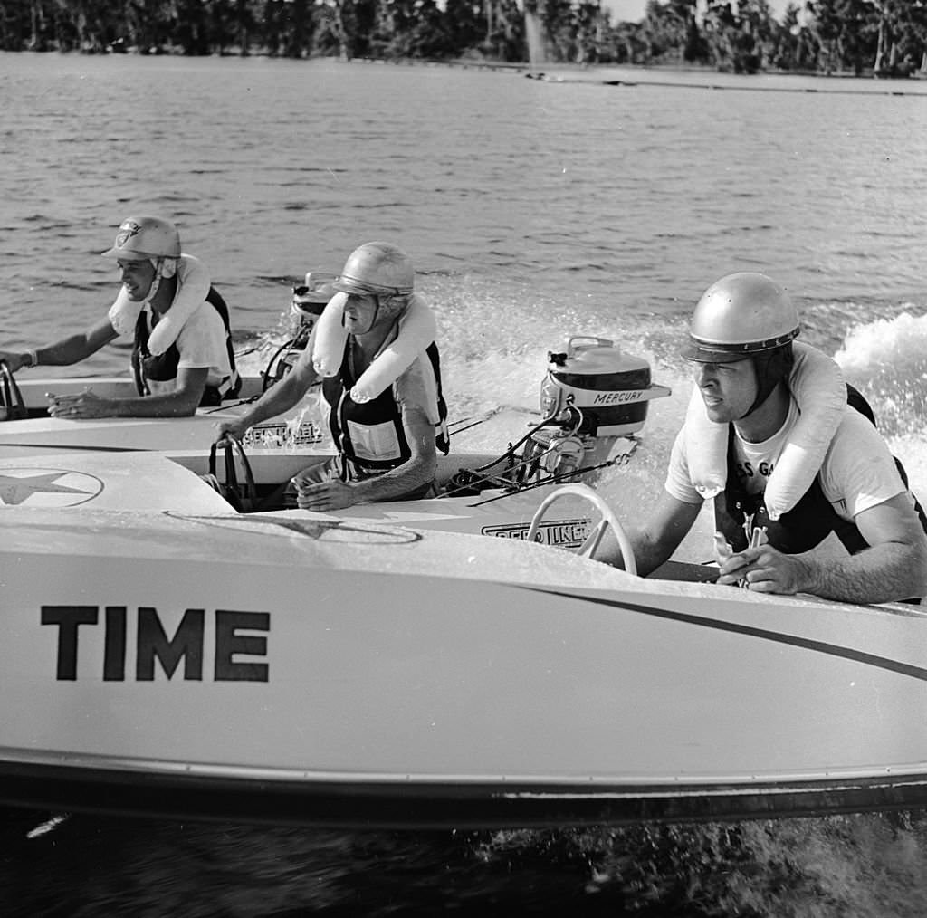 #19 Three speedboat racers prepare to set off around the Cypress Gardens course in Florida, 1956.