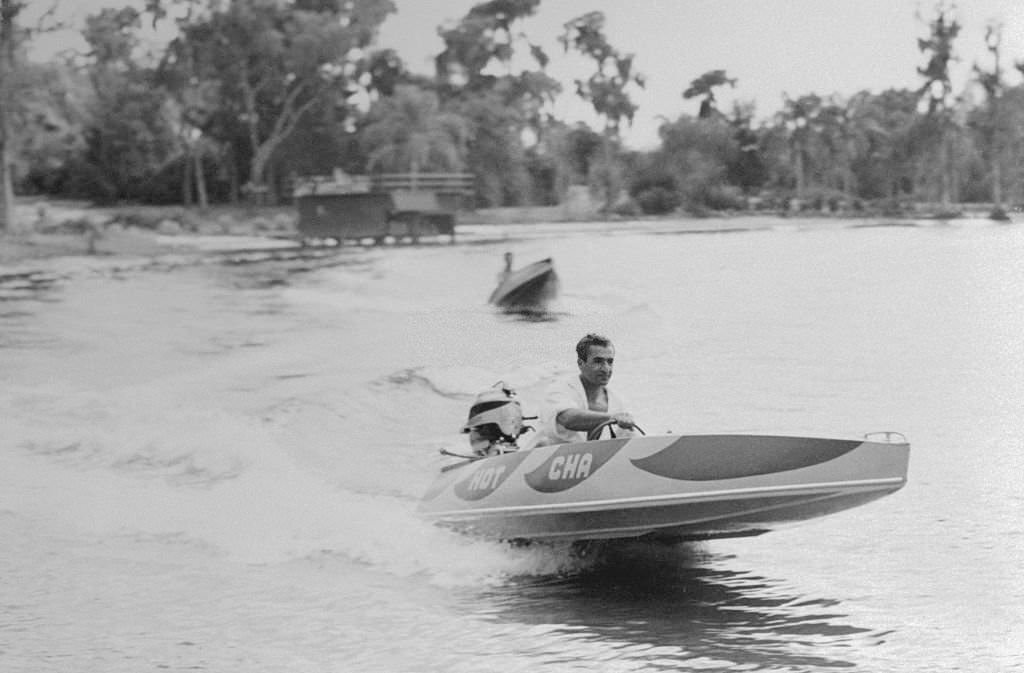 #30 Reza Pahlevi, Shah of Iran, Driving Speedboat, 1950s