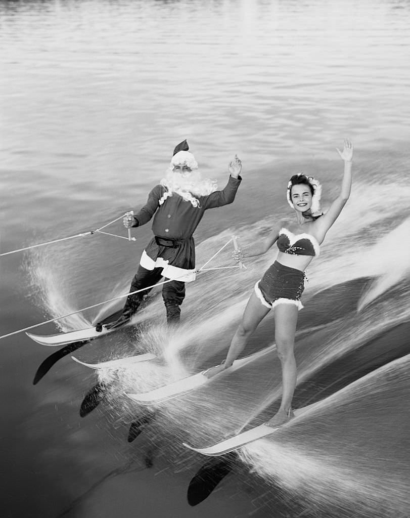 #34 This Santa Claus helper has left Rudolph the Red-Nosed Reindeer and his sleigh up north and has taken to water skiing at Cypress Gardens, Florida.