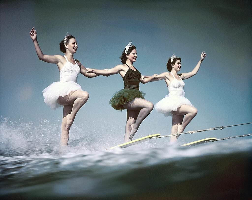 #46 A trio of acrobatic water skiers perform during a show at Cypress Gardens theme park in 1953 near Winterhaven, Florida.