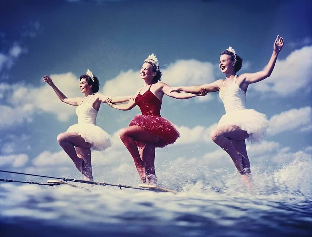 #48 A trio of acrobatic water skiers perform during a show at Cypress Gardens theme park in 1953 near Winterhaven, Florida.