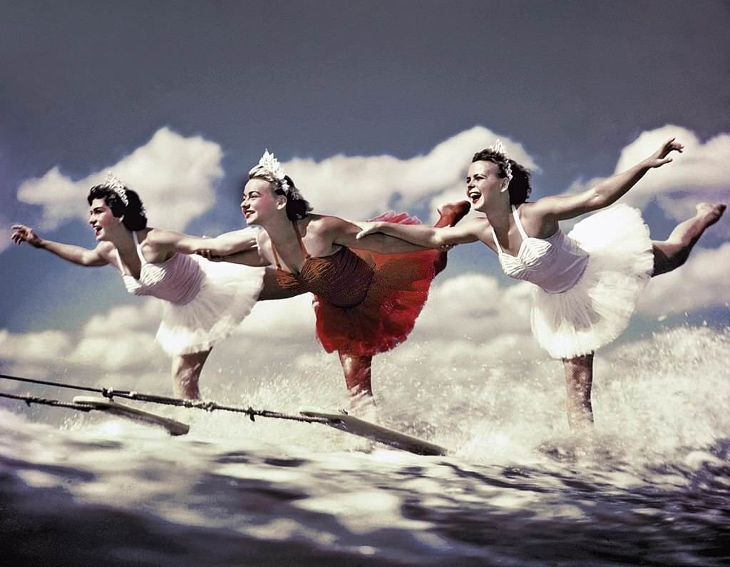 #52 A trio of acrobatic water skiers perform during a show at Cypress Gardens theme park in 1953 near Winterhaven, Florida.