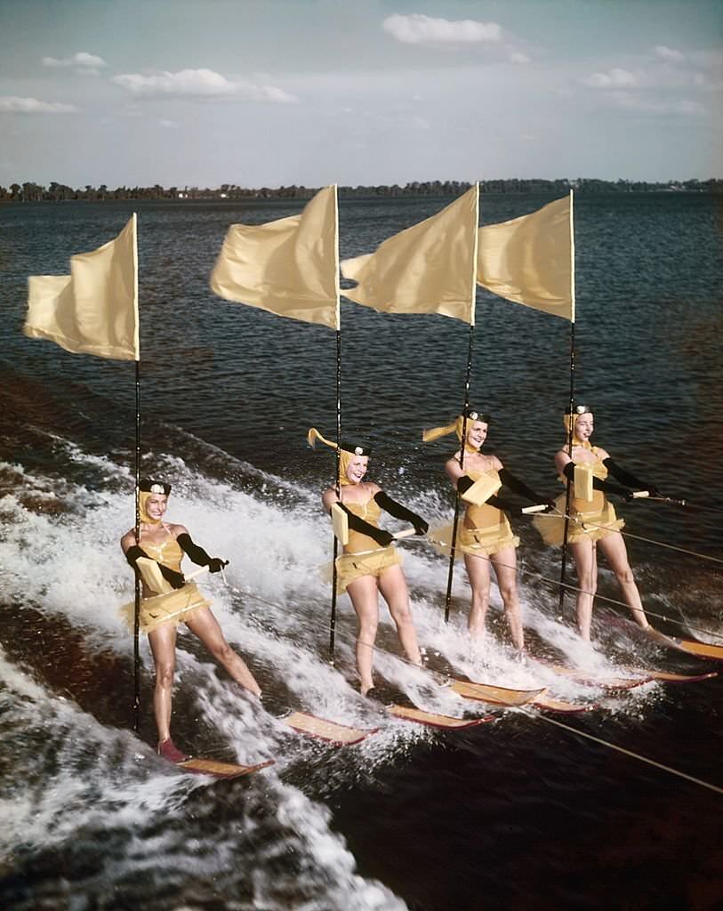 #62 A group of acrobatic water skiers perform during a show at Cypress Gardens theme park in 1953 near Winterhaven, Florida.