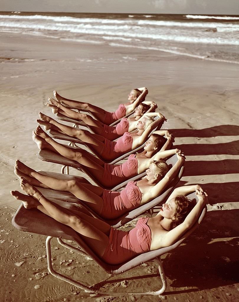 #72 A group of southern belle models sunbathe on the beach at Cypress Gardens theme park in 1953 near Winterhaven, Florida.