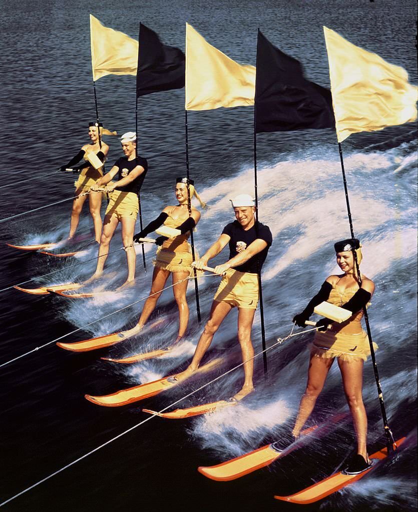 #75 A group of acrobatic water skiers perform during a show at Cypress Gardens theme park in 1953 near Winterhaven, Florida.