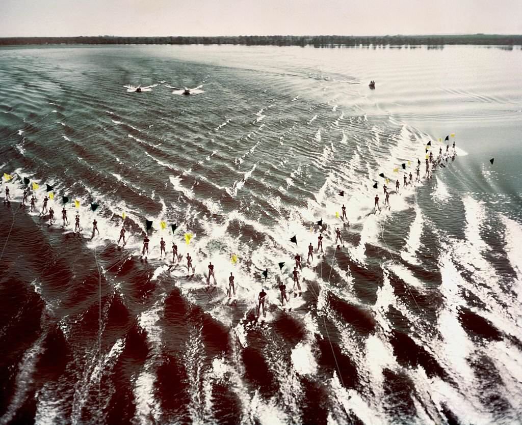 #78 A group of acrobatic water skiers perform during a show at Cypress Gardens theme park in 1953 near Winterhaven, Florida.