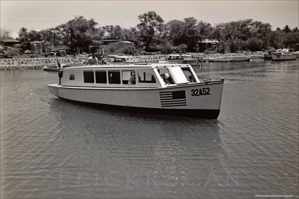#19 Glass bottom boat in Ala Wai Canal near the Kalakaua Avenue Bridge, 1940