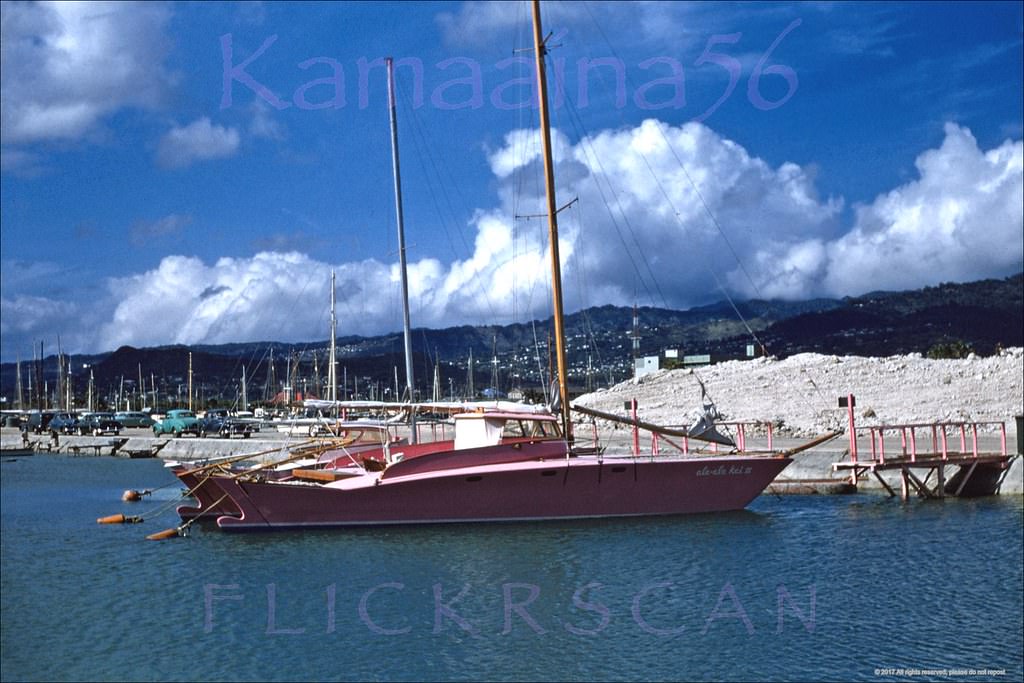 #79 The Hawaiian Village Hotel’s “Kaiser Pink” catamaran Ale Ale Kai III moored at neighboring Ala Way Harbor, 1950s