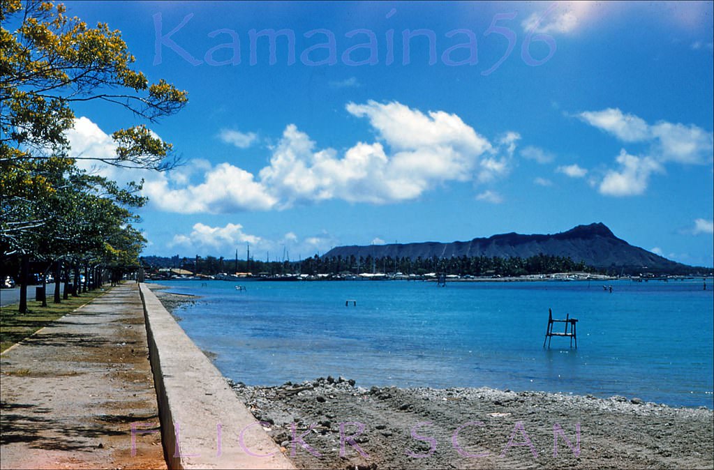 #89 Looking east from the park towards Ala Wai Harbor and Diamond Head. Not much of a beach yet and Magic Island was a decade away, 1950s