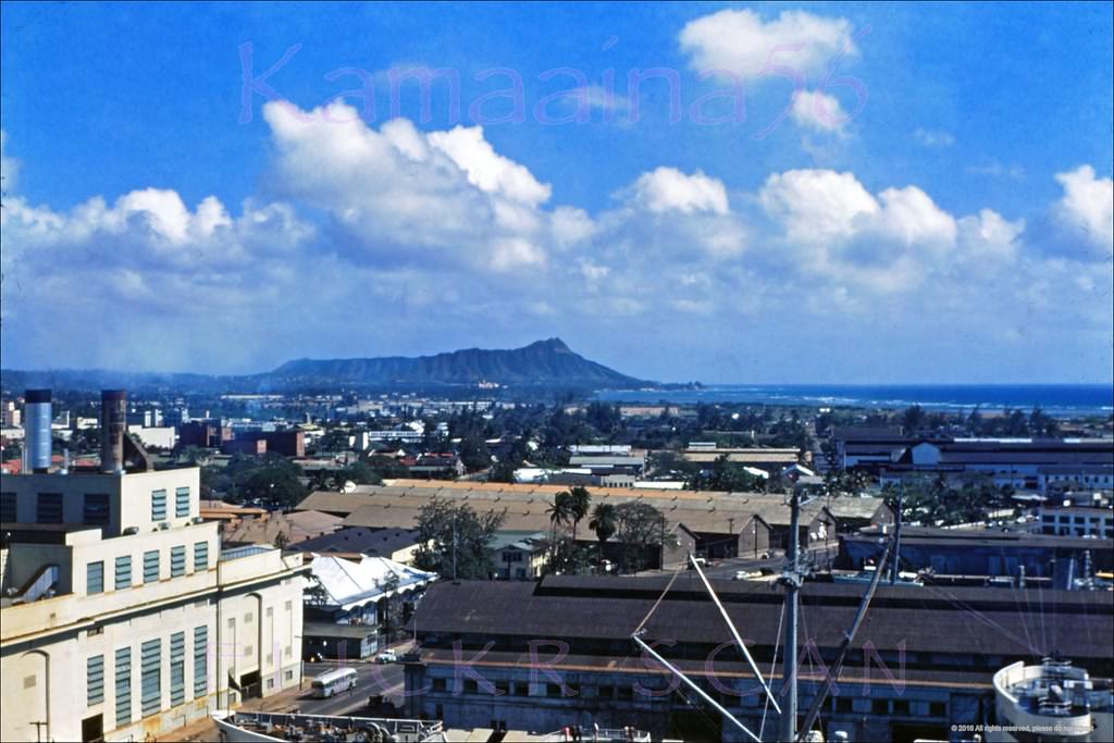 #47 The Honolulu Harbor area looking towards a low-rise Waikiki from the 1926 10-story Aloha Tower, 1949