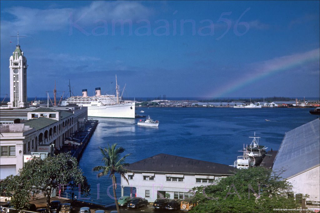 #156 Matson Lines flaghip SS Lurline being nudged into Pier 11 at Honolulu Harbor, 1950