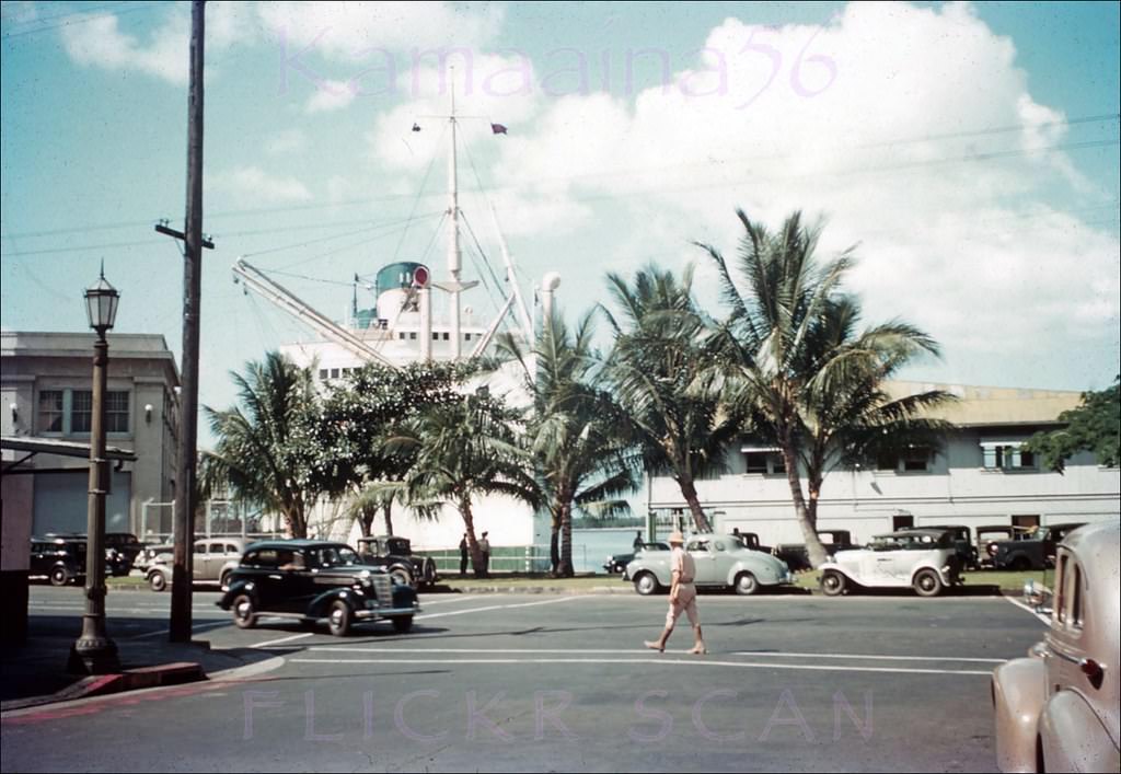 #51 Street-level view of a Boat Day at the Matson Lines Terminal on Ala Moana Road (now Nimitz Highway) at Queen Street in downtown Honolulu, 1941