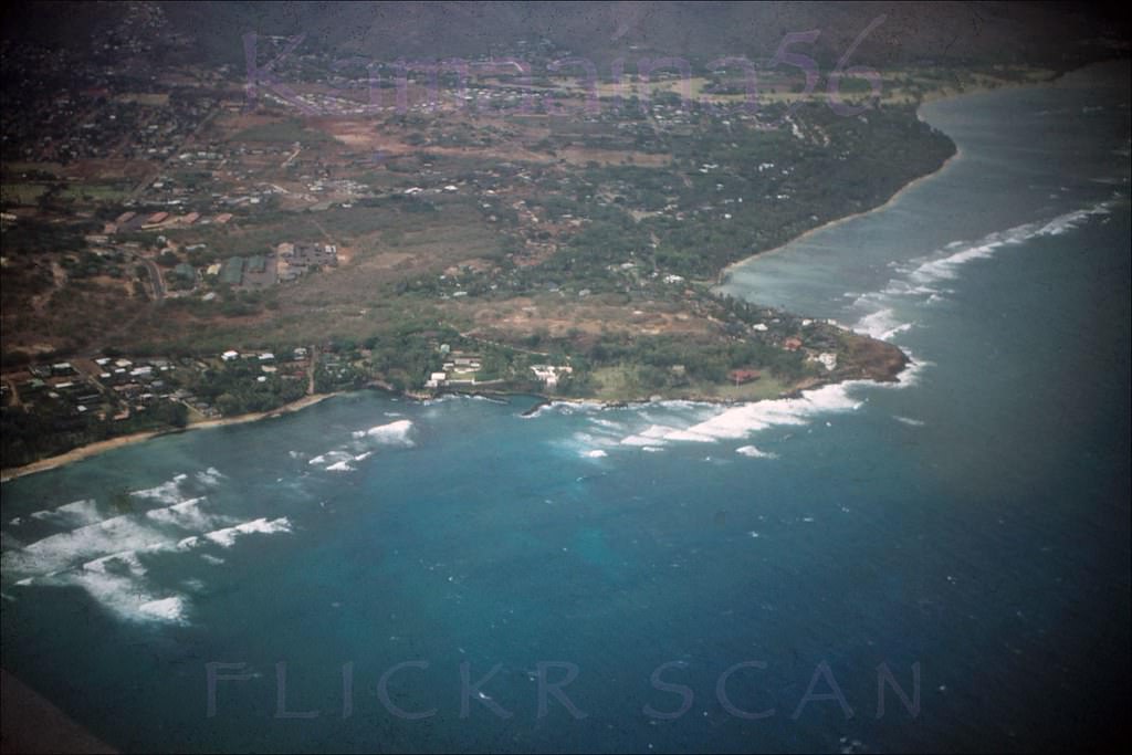 #205 Airplane view of an undeveloped Black Point on the east side of Diamond Head, 1953