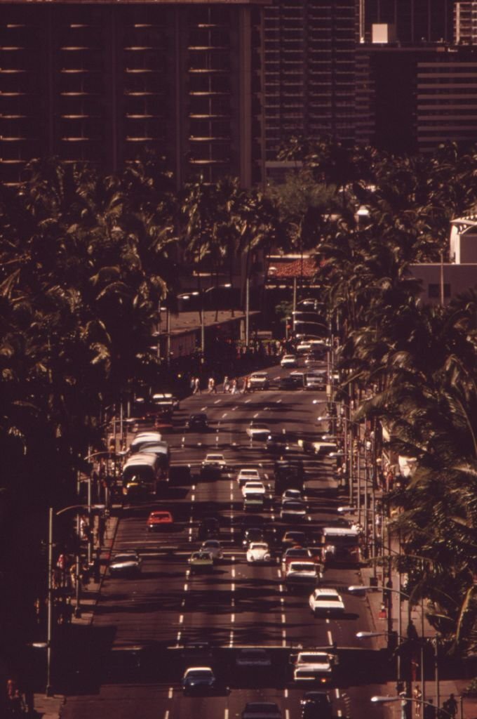 #14 View of traffic down Kalakaua Avenue, the main street of the Waikiki Beach area, Honolulu, Hawaii, October, 1973.