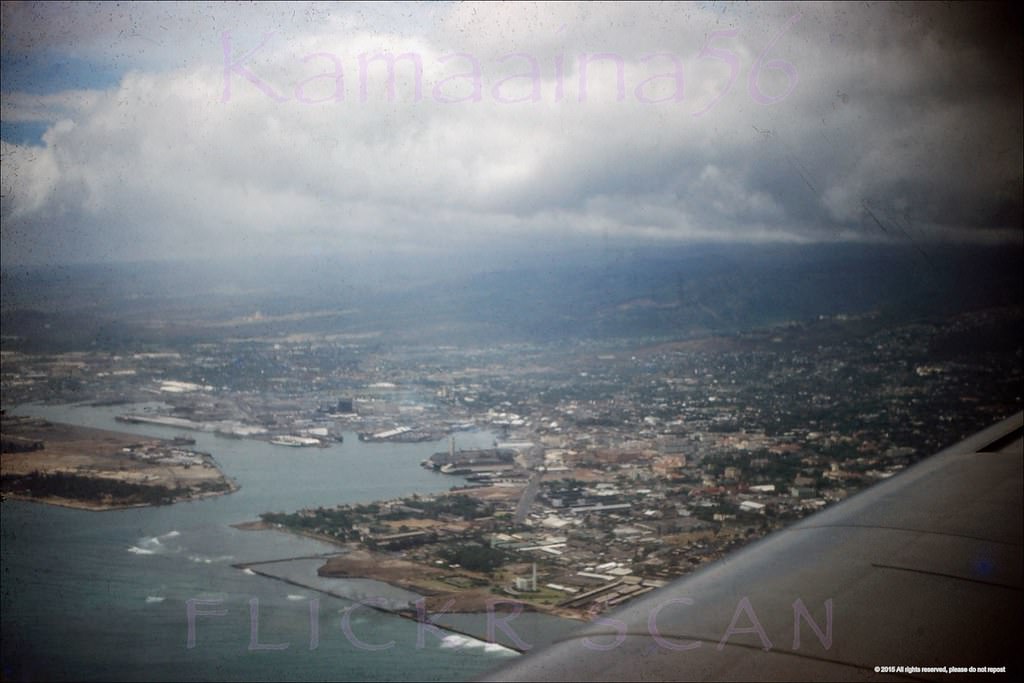 #1 Airplane view over Kakaako heading towards Honolulu Airport, 1952. The entire area out to the breakwaters is now landfill