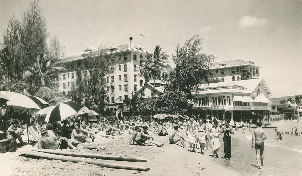 #97 Crowded beach scene with sun umbrellas, 1940s