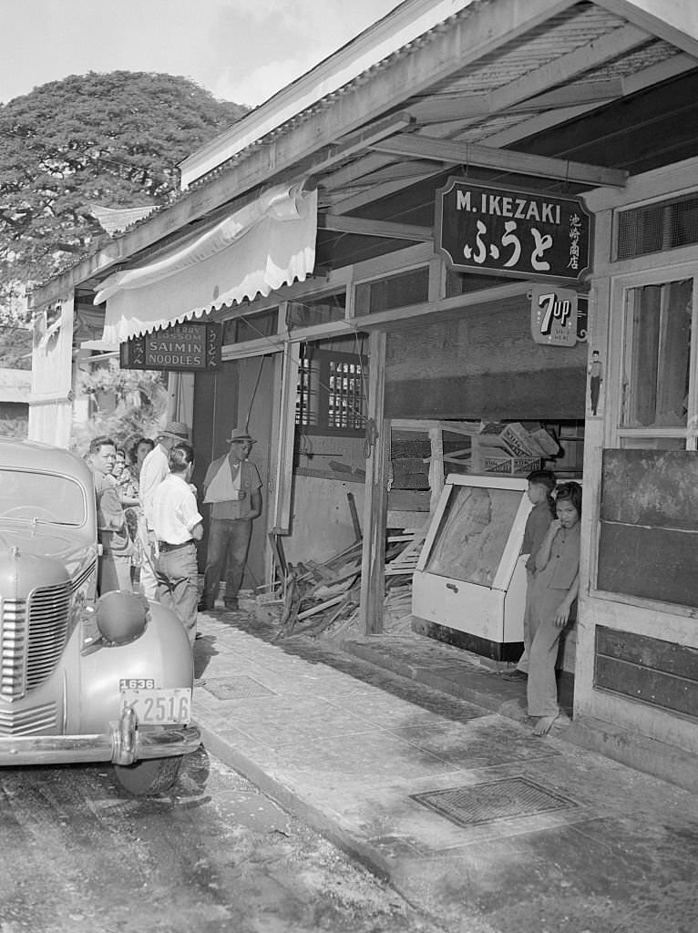 #118 This is a photo of wreckage in Honolulu following the Japanese sneak raid of December 7th.