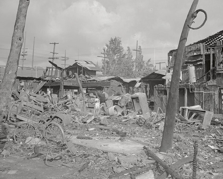 #120 Bombs dropped from Japanese planes rained suddenly out of the skies on December 7, 1941, leaving a wake of death and ruins on this Pacific Ocean outpost of the United States, a scene of devastation in suburban Wakiki Beach, a favorite resort spot of tourists from the island.