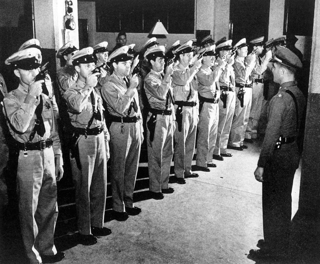 #143 A police department on the Hawaiian island of Honolulu, formed by volunteers, practicing using guns. Honolulu, January 1942