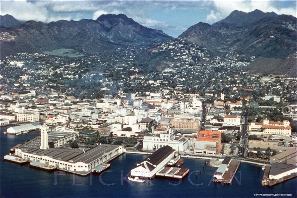 #6 Detailed airplane view of Honolulu Harbor looking inland, 1950s