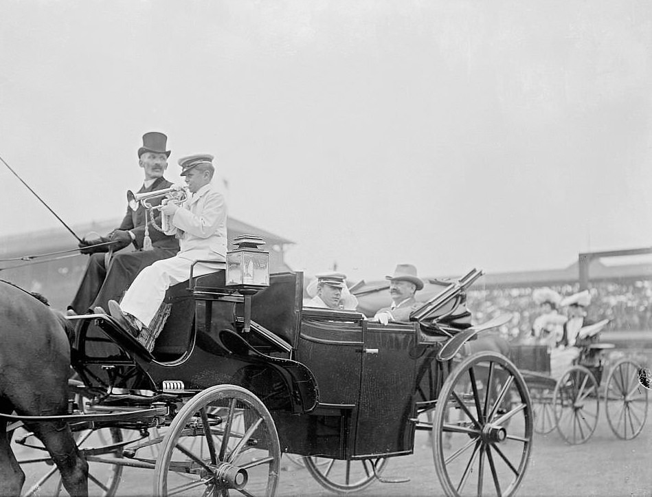 #144 Men riding in a carriage, and two men sitting on the driver’s bench, at the Washington Park Race Track on Derby Day, Chicago, Illinois, 1903.