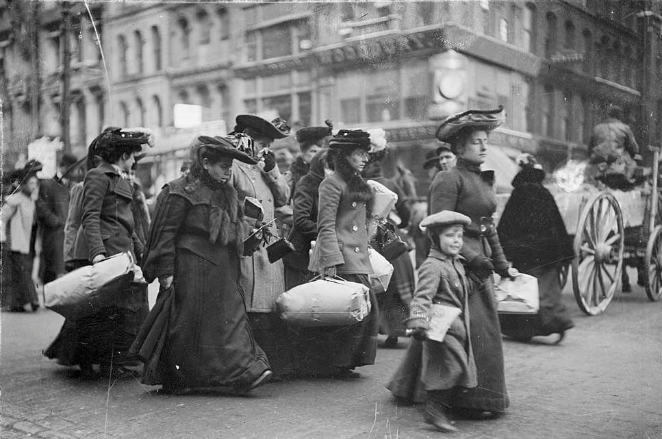 #151 Christmas shoppers walking in a commercial street, Chicago, Illinois, 1903.