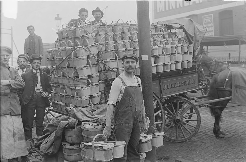 #171 Several men standing around a cart filled with baskets of peaches in the South Water Street Market in Chicago, Illinois, 1902
