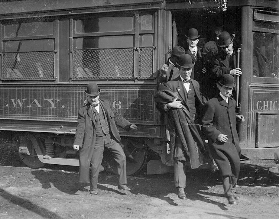 #42 Men exiting a Chicago Union Traction Railway streetcar, Chicago, 1906.