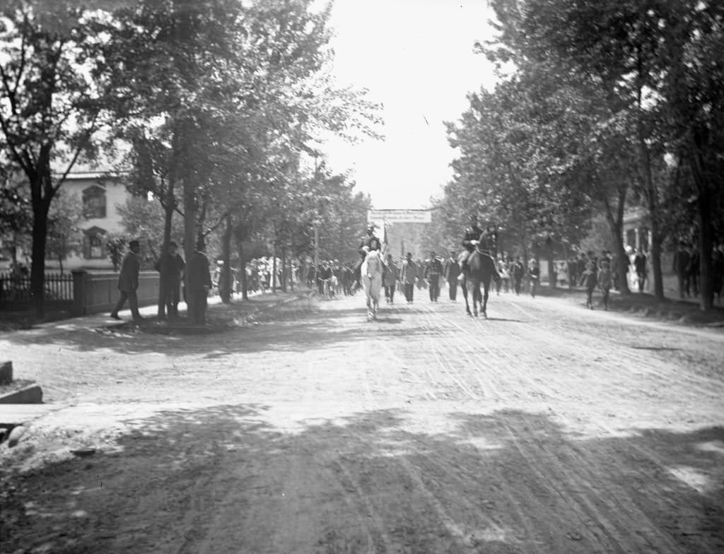 #72 View down street of German soldiers on a march from the depot of the Chicago, Milwaukee, and St Paul Railroad on their way to Turner Hall, June 17, 1900.