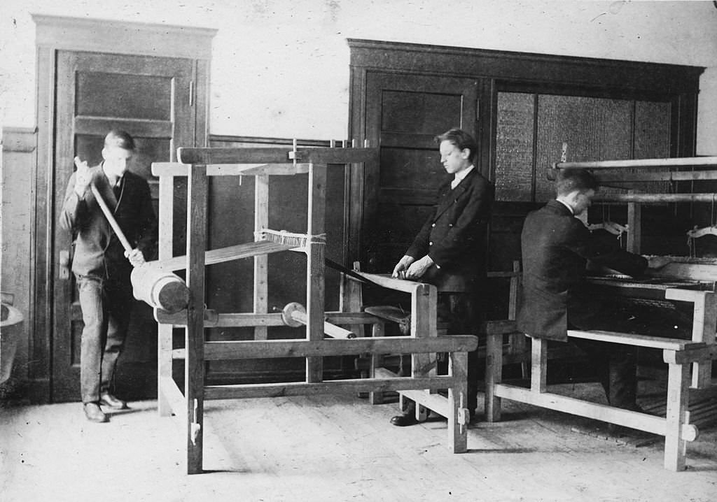 #90 Weaving in a series detailing the stages of linen production at the Chicago Normal School, Chicago, 1900s