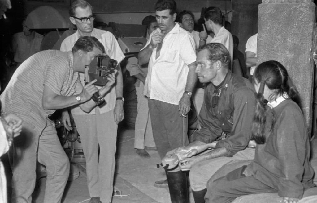 #108 American actor Charlton Heston during the filming of the movie “55 Days in Peking” on August 27, 1962 in Madrid, Spain.