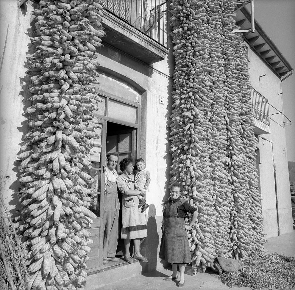 #36 Family with corn crop at house door, Barcelona, 1961.