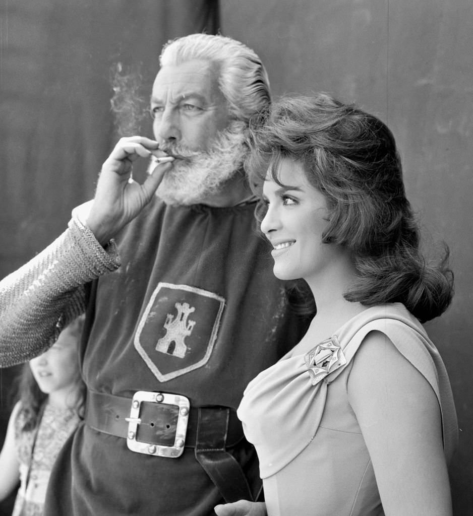 #245 The Mexican actress Teresa Velazquez and the American actor Cesar Romero in the filming of the movie’ El Valle de las Espadas’, 1962, Madrid, Spain.