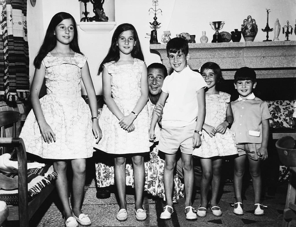 #63 Spanish aristocrat and heart surgeon Marquis Cristobel De Villaverde (behind) with his children, 1960