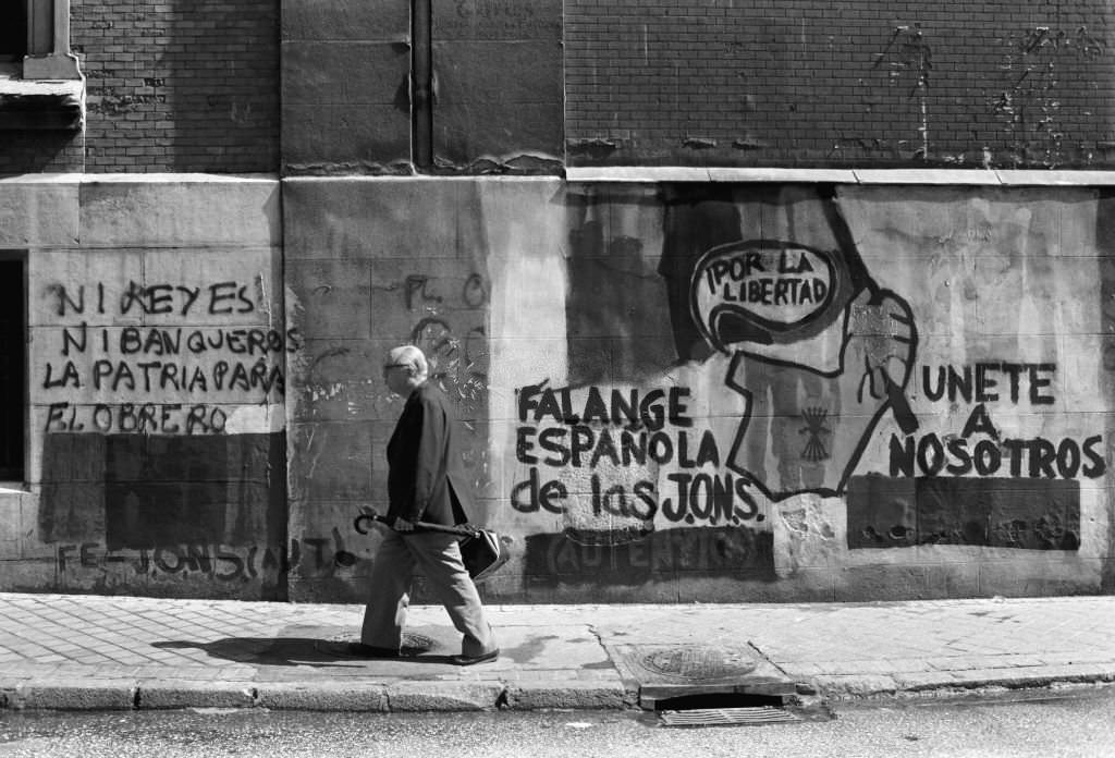 #105 Political graffiti on a wall in Madrid, Spain, August 20, 1977.