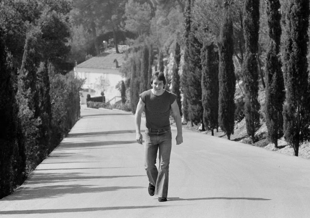 #169 Liverpool footballer Jimmy Case taking a walk near to the team’s hotel in Barcelona, prior to the UEFA Cup Semi Final, 1976