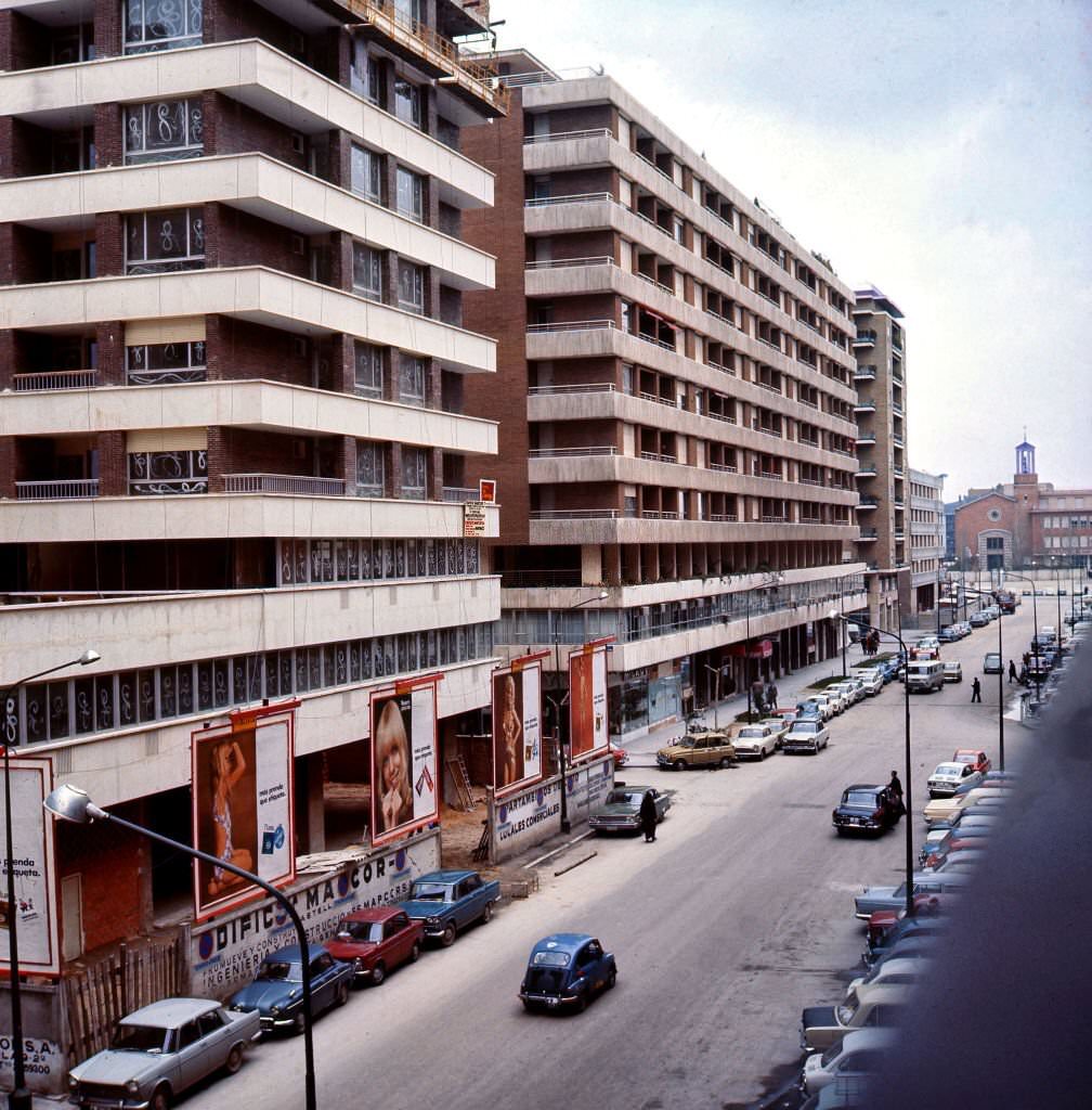 #27 A general view of Felix Boix Street, near Plaza de Castilla, with the Colegio de Nuestra Señora de la Consolacion in the background, in Madrid, Spain, 1970.