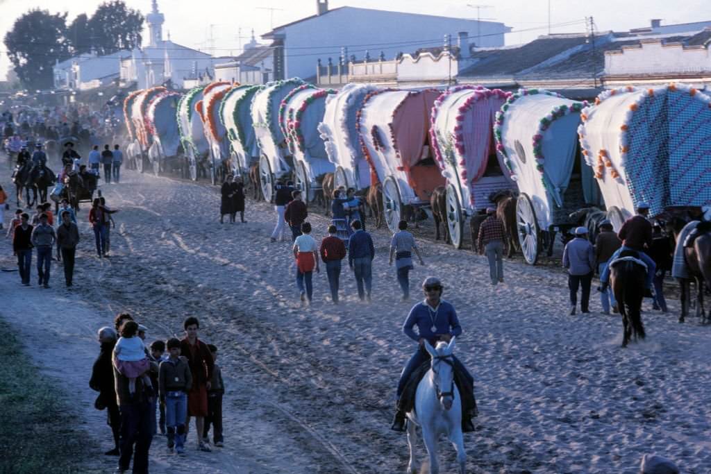 #39 Procession of carts during the pilgrimage of El Rocío, in Almonte, in May 1983, in Andalusia, Spain.