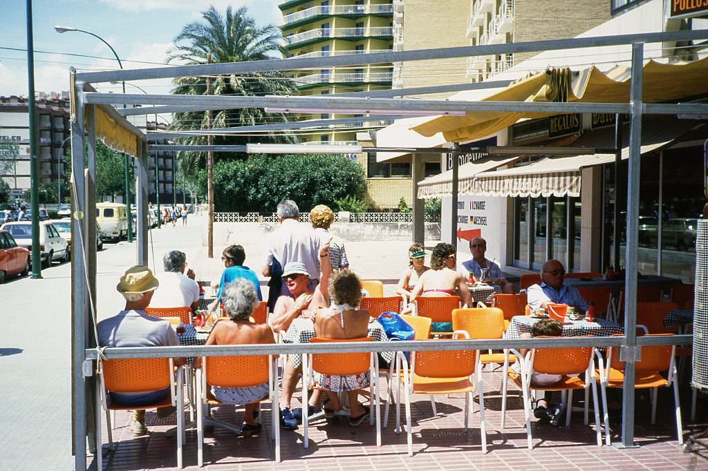 #56 Tourists having lunch in Marbella, 1982, Malaga, Andalusia, Spain.