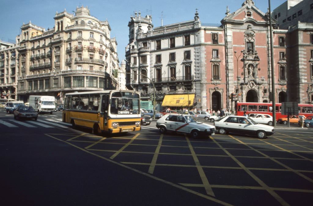 #63 Traffic on the Gran Via in Madrid, in October 1985, Spain.