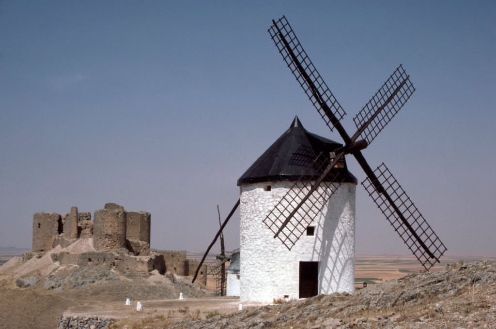 #67 Mill in front of the Muela castle in Consuegra, in October 1985, in Castile-La Mancha, Spain.