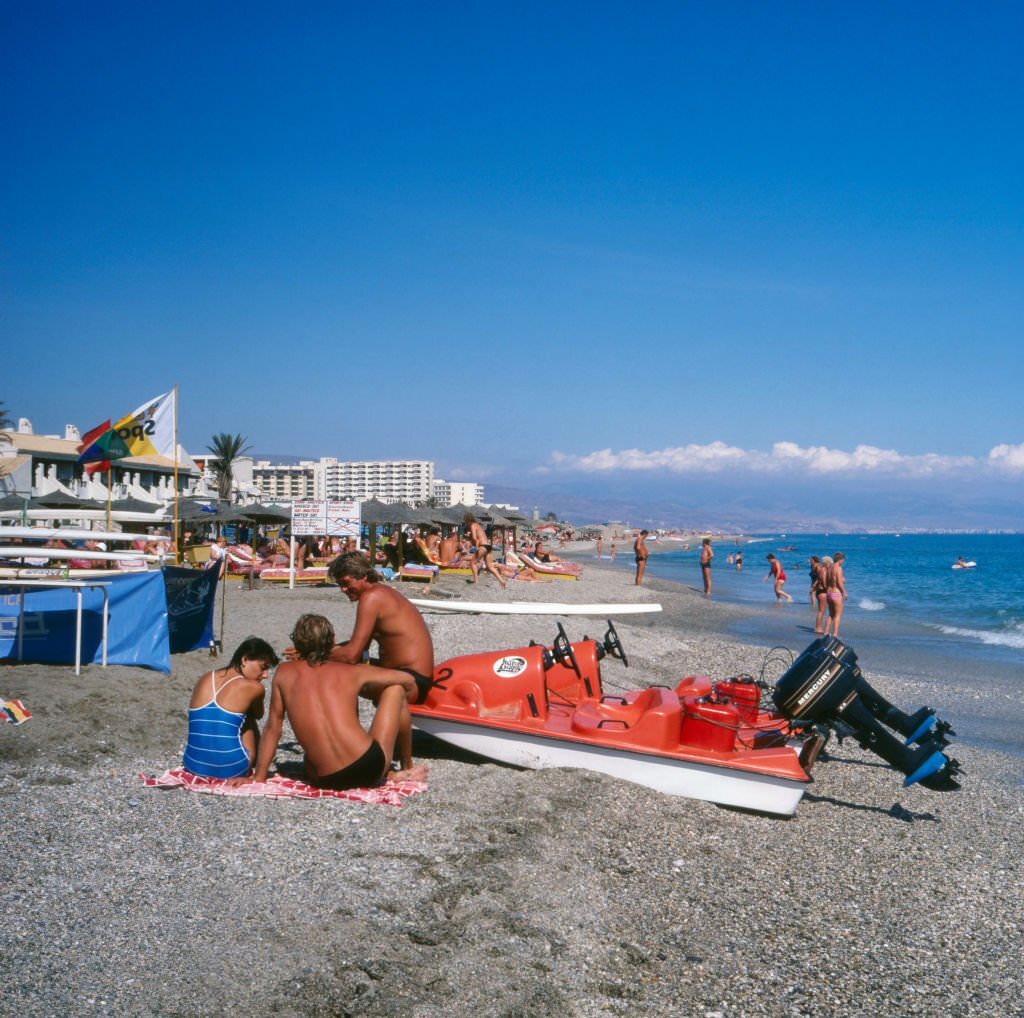 #86 At Roquetas de Mar beach, Spain 1980s.