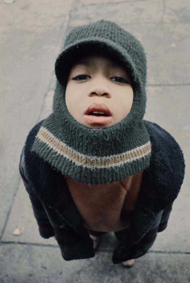 #19 Boy looking up, South Bronx, 1970