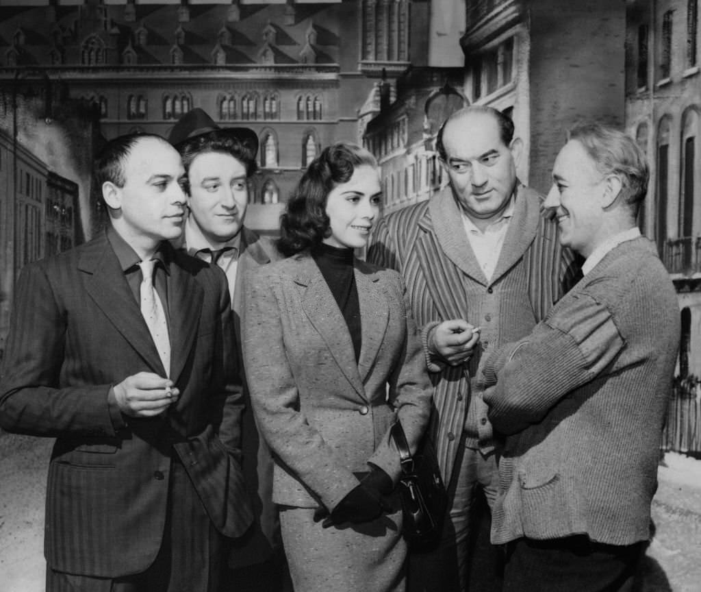 Seventeen-year-old Judy Verity ‘Miss Jamaica’ meets some tough, but friendly characters, during a visit to Ealing Studios.