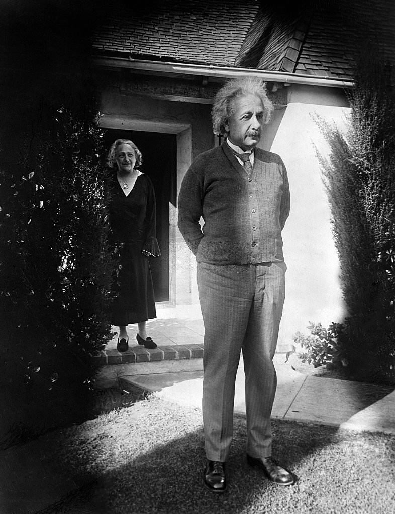 #105 Albert Einstein with his wife Elsa in Pasadena, California, 1931