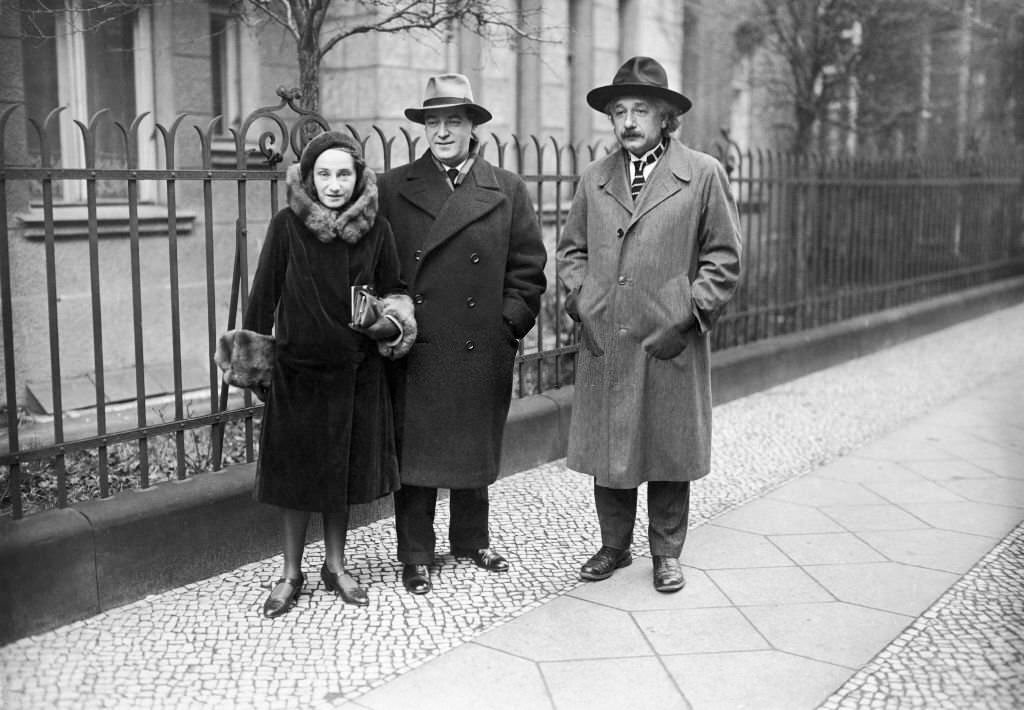 #111 Albert Einstein with his siter Margot and her husband Dimitri Marianoff on the day of their marriage, 1930