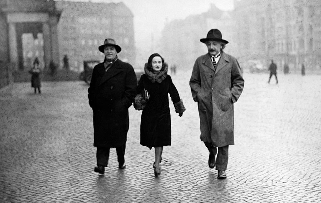 #114 Albert Einstein with his daughter Margot and Russian author Dimitrij Marianoff on the way to their wedding at the city hall in Berlin Schoeneberg, 1930