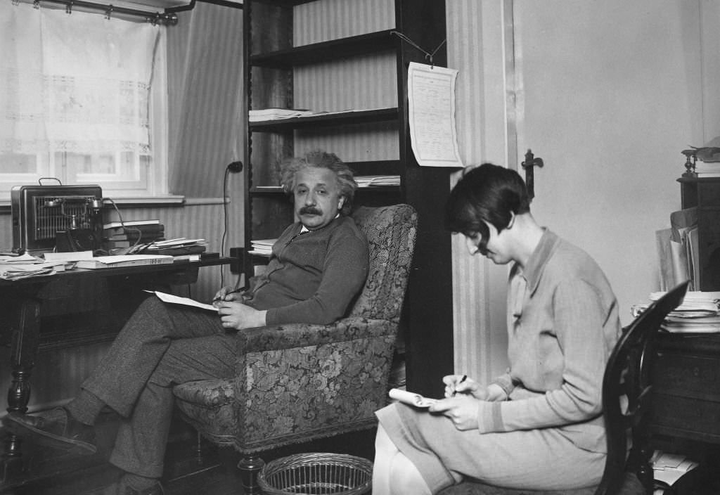 #49 Albert Einstein dictating something to his secretary, 1930