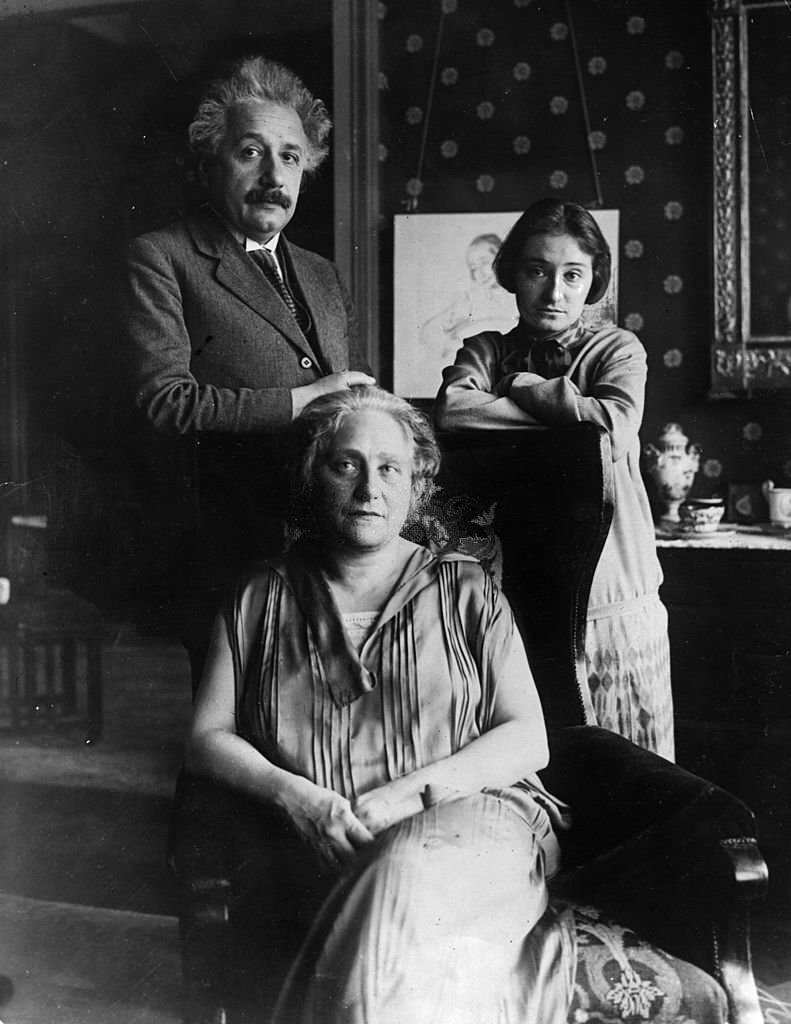 #118 Albert Einstein with his wife Elsa and daughter Margot, at their home in Berlin, 1929